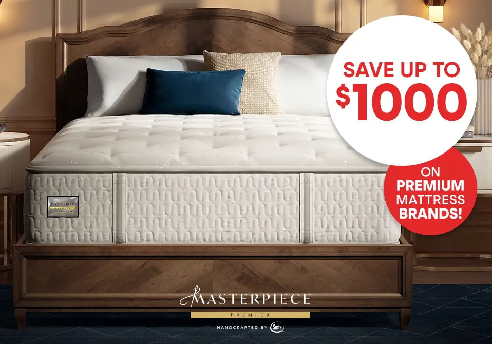 Save up to $1000 on premium mattress brands. A Masterpiece Premier mattress handcrafted by Serta on a wooden bed frame.