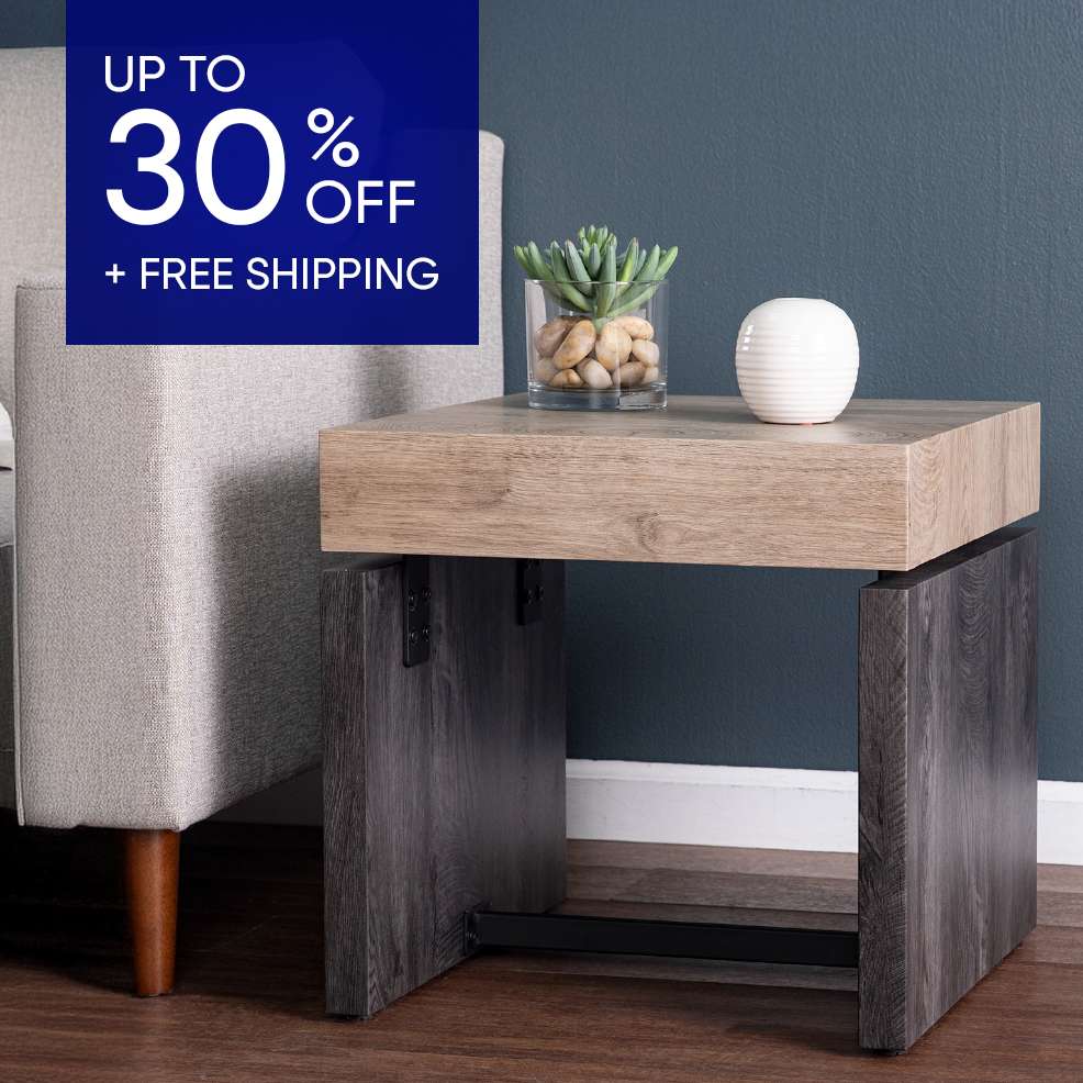 UP TO 30% OFF + FREE SHIPPING. A modern side table with a succulent and a white vase.
