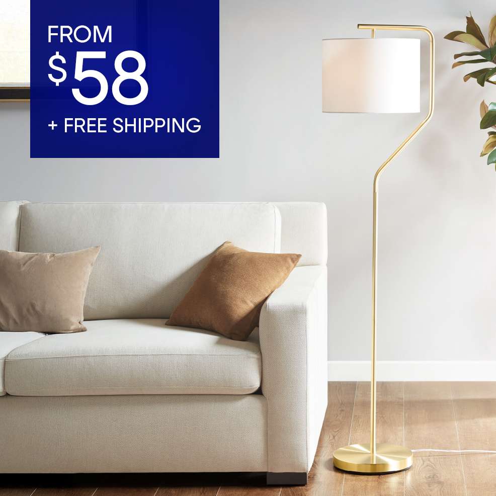 From $58 + Free Shipping. A gold floor lamp next to a white couch with pillows.

