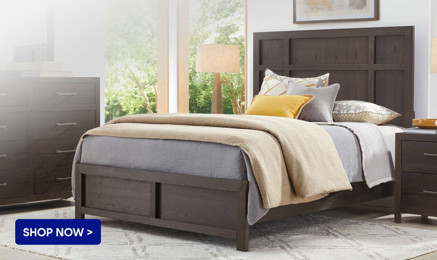 SHOP NOW > A bedroom set with a bed, dresser, and nightstand.
