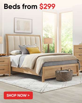Beds from $299. A bed in a bedroom.
