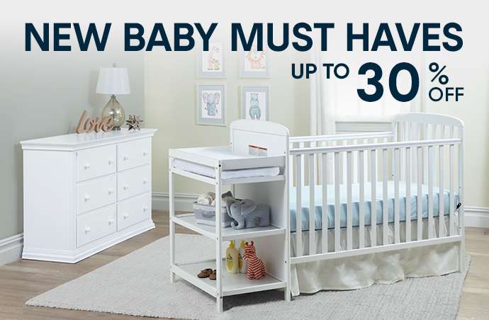 NEW BABY MUST HAVES UP TO 30% OFF. A white crib, changing table, and dresser.
