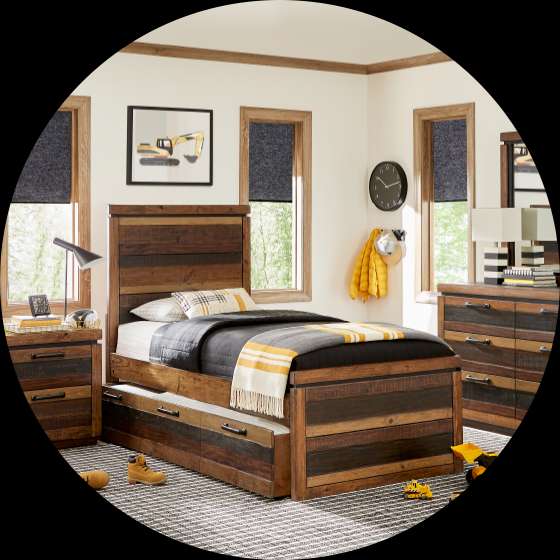Bedroom set with a bed, dresser, and nightstand.
