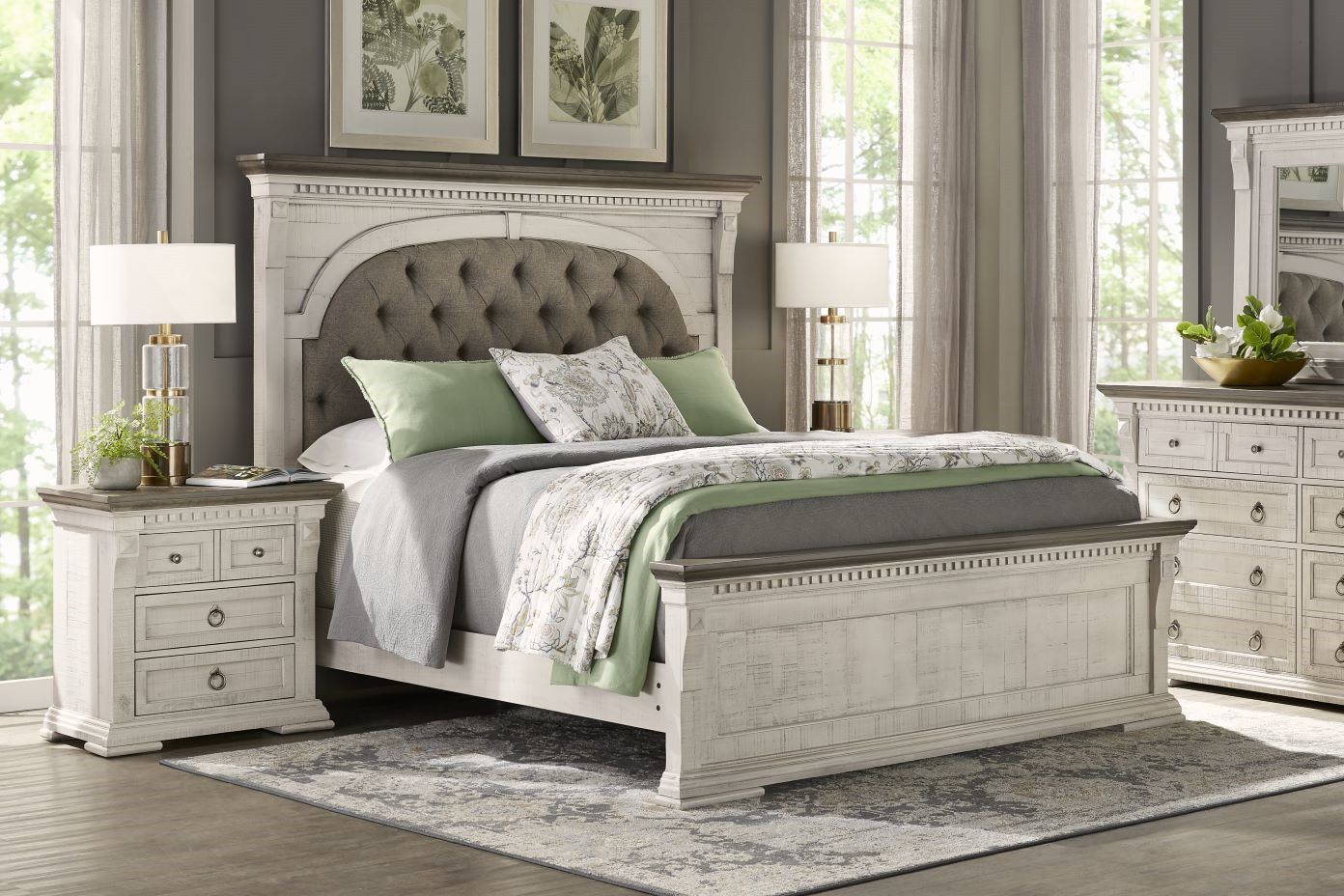 Bedroom set with a bed, nightstand, and dresser.
