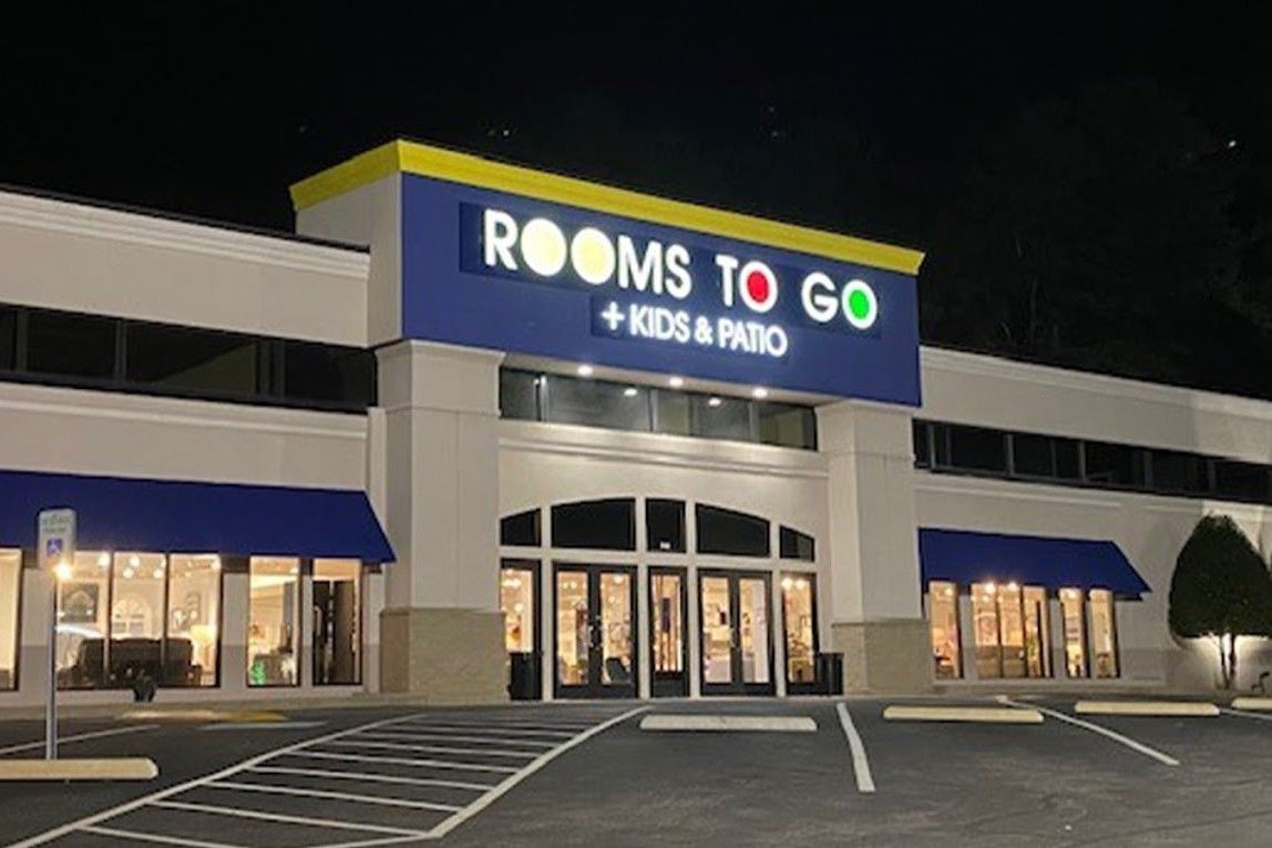 Rooms To Go + Kids & Patio store sign.
