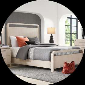 Bedroom set with a light-colored bed frame, headboard, and nightstands.
