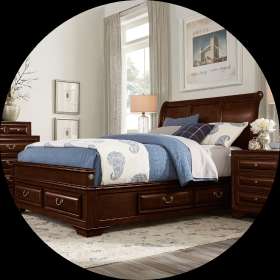 Bedroom set with a dark brown bed frame with storage drawers.
