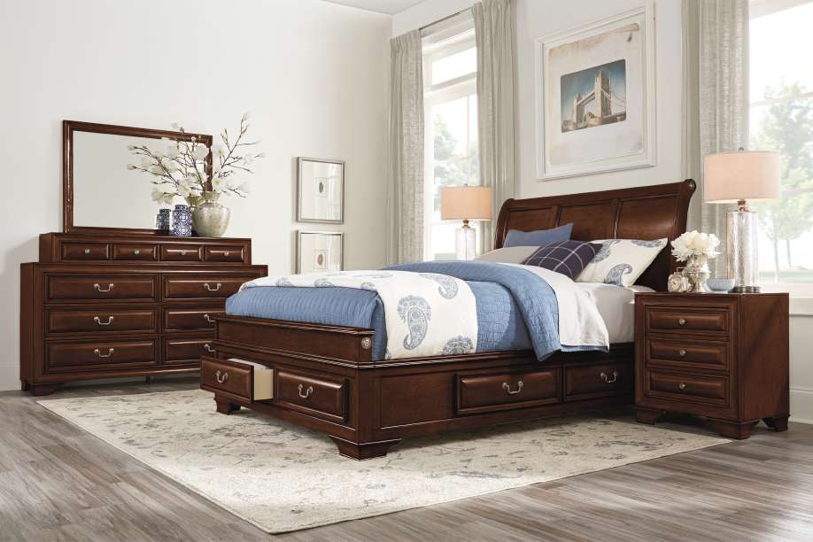 Bedroom furniture set with a bed, dresser, and nightstand.

