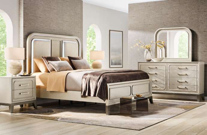 Bedroom furniture set with a bed, nightstand, dresser, and mirror.
