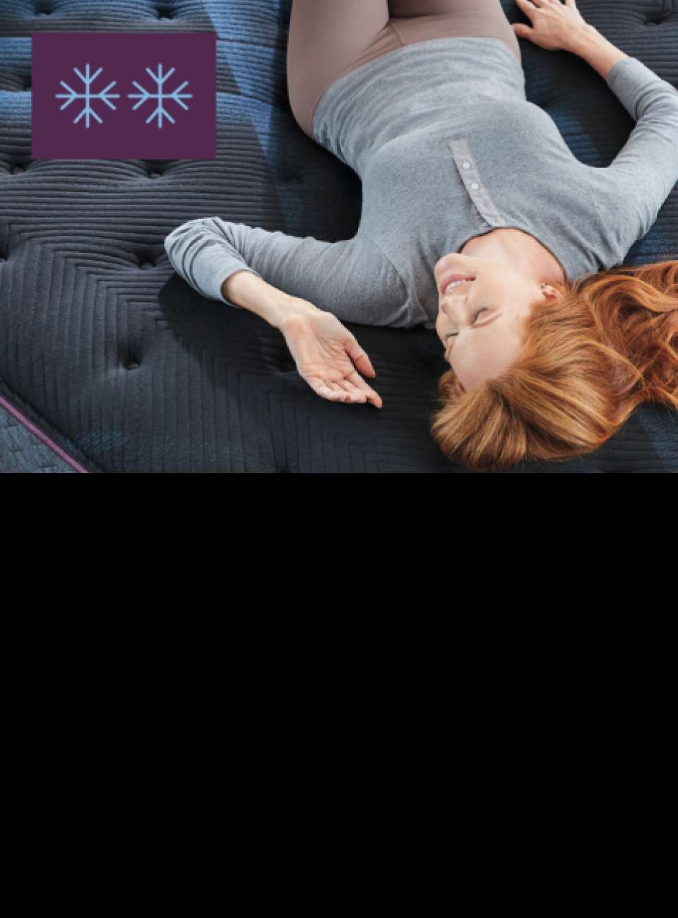 Woman lying on a mattress with a cooling feature.
