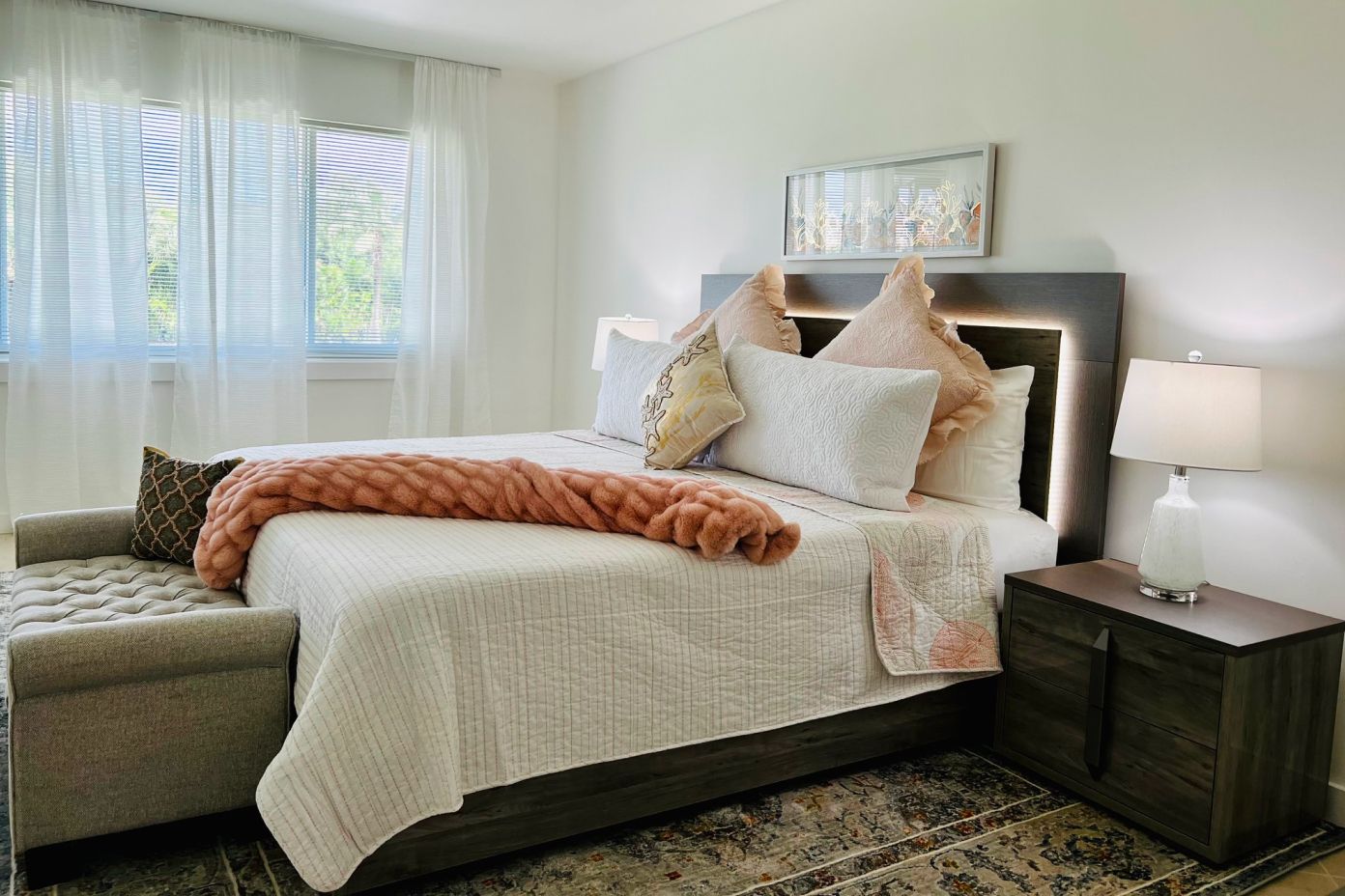 Bedroom with a bed, nightstand, and window.
