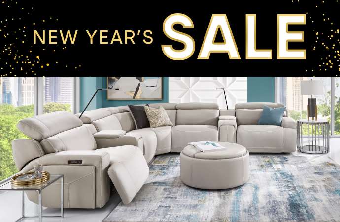 NEW YEAR'S SALE. A sectional sofa in a living room.
