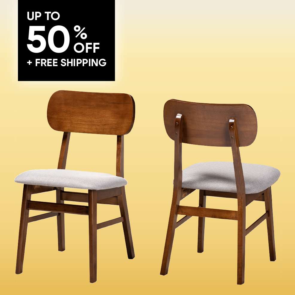 UP TO 50% OFF + FREE SHIPPING. Two wooden chairs with gray cushioned seats.
