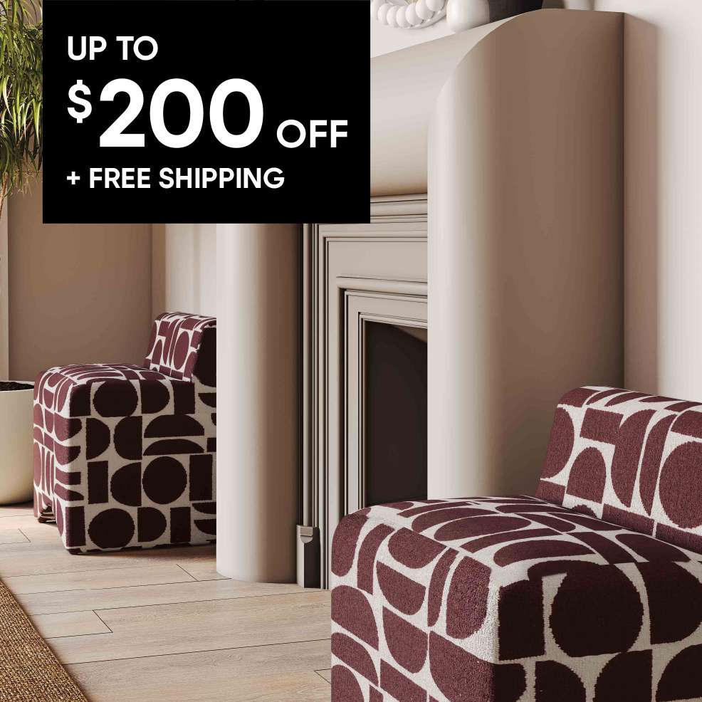 Up to $200 off + free shipping. Two patterned armchairs in a modern room.
