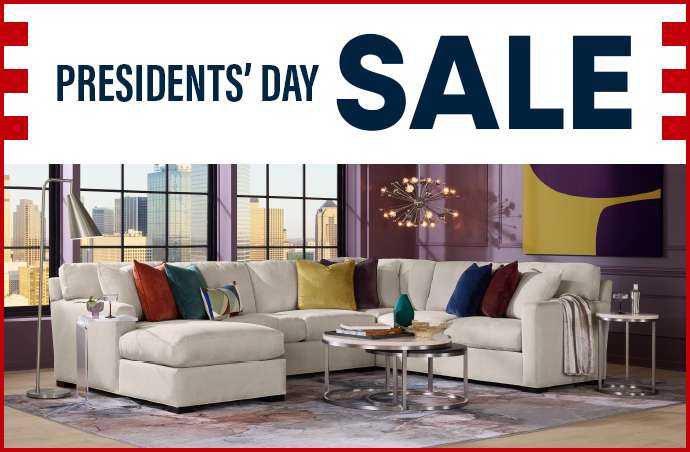 PRESIDENTS' DAY SALE. A sectional sofa with colorful pillows.
