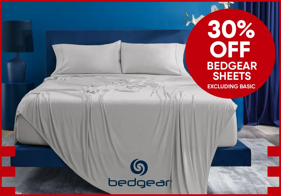 30% OFF BEDGEAR SHEETS EXCLUDING BASIC. A bed with gray sheets.
