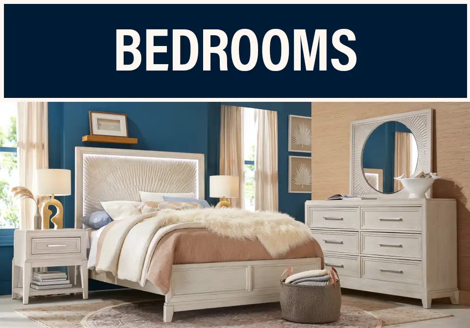 BEDROOMS. Bedroom furniture set with a bed, nightstand, dresser, and mirror.