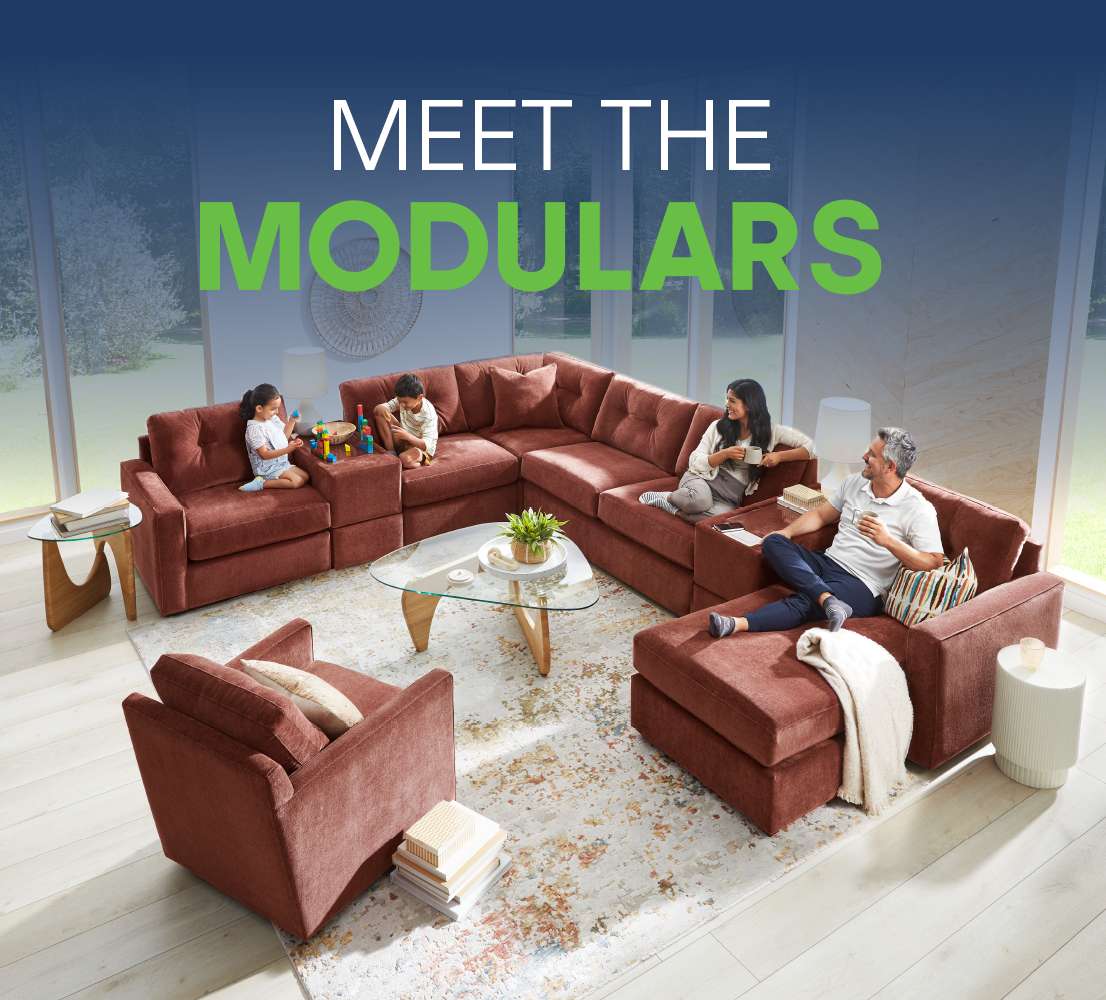 MEET THE MODULARS. A family sits on a modular sofa.
