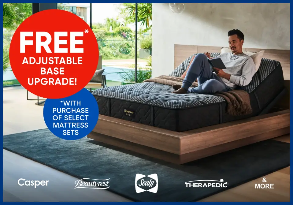 FREE adjustable base upgrade with purchase of select mattress sets. A man is reading on an adjustable bed.
