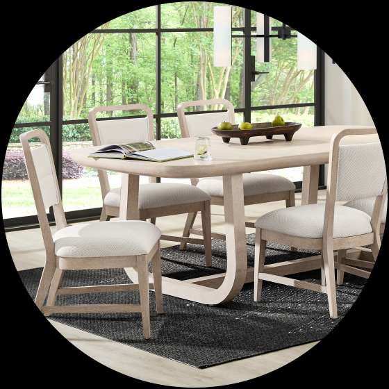 Dining table and chairs in a modern style.

