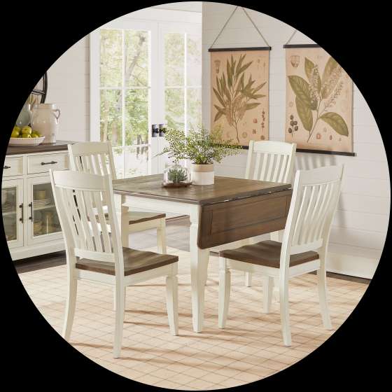 Dining room set with a table and four chairs.
