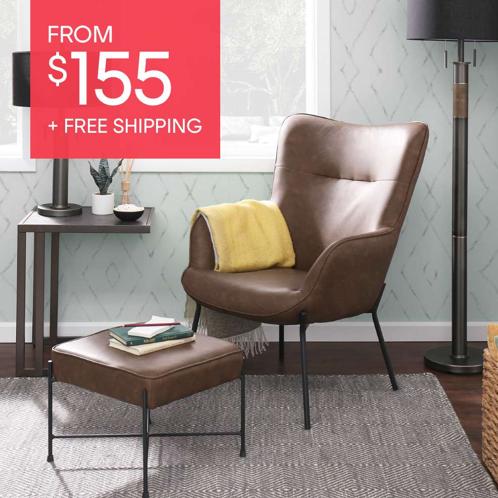 FROM $155 + FREE SHIPPING. A brown leather chair and ottoman set.
