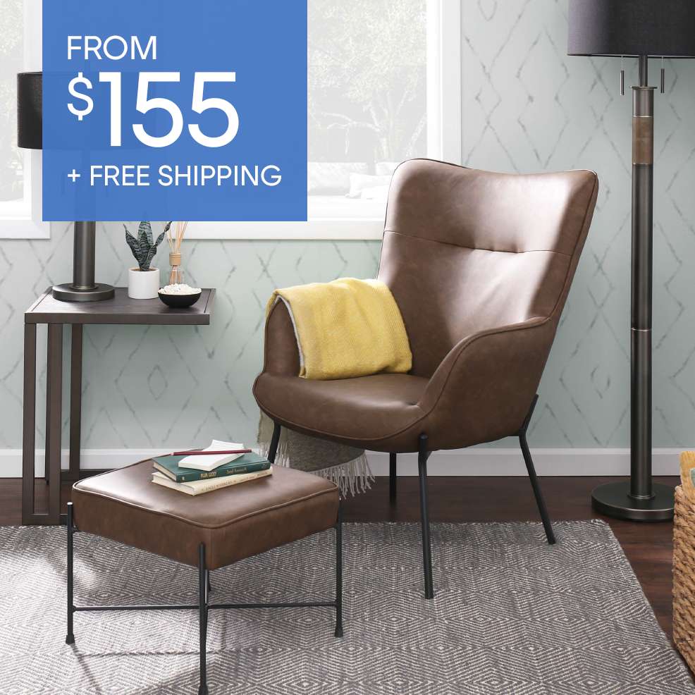 FROM $155 + FREE SHIPPING. A brown leather chair and ottoman with a yellow blanket.
