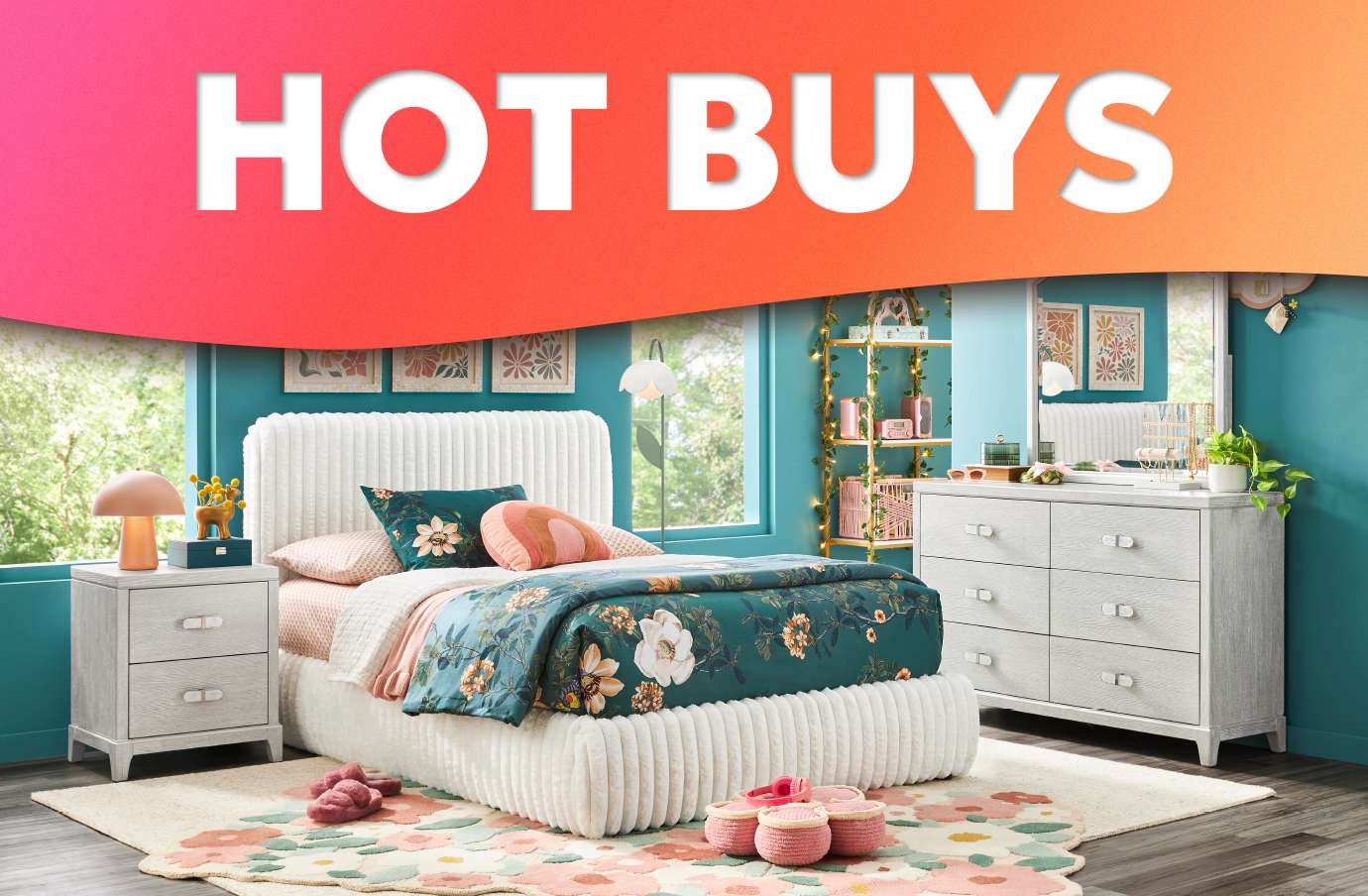 HOT BUYS. A bedroom with a bed, nightstand, and dresser.
