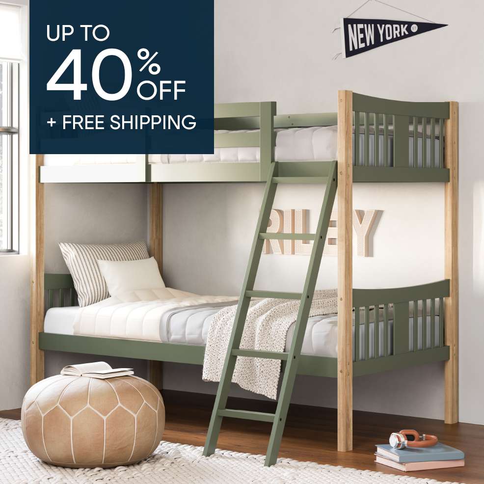 Up to 40% off + free shipping. A green and wood bunk bed.
