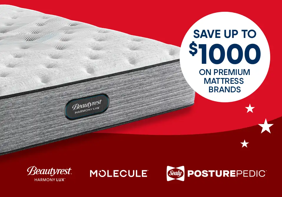 Save up to $1000 on premium mattress brands. The image shows a Beautyrest Harmony Lux mattress.
