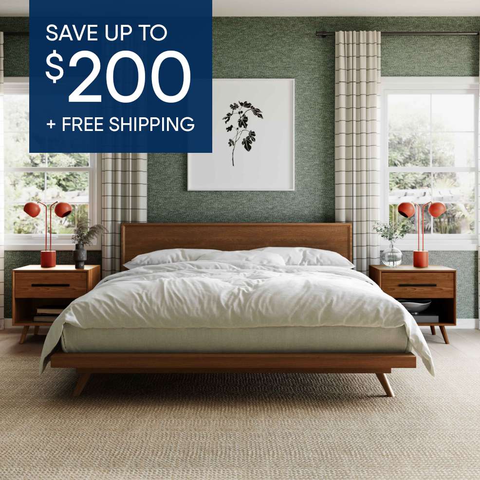SAVE UP TO $200 + FREE SHIPPING. A bedroom with a wooden bed frame, nightstands, and a framed picture.
