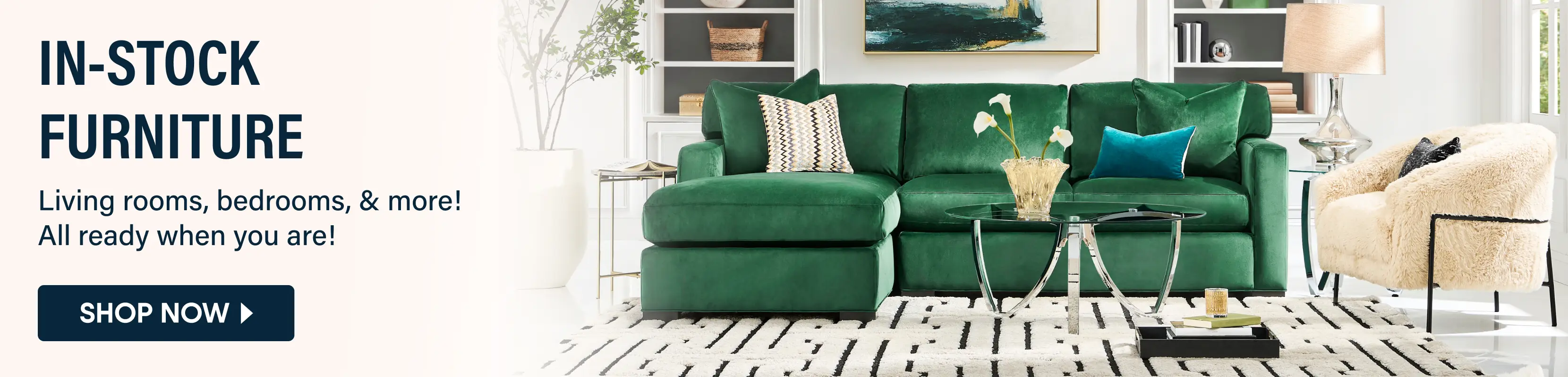 IN-STOCK FURNITURE: Living rooms, bedrooms, & more! All ready when you are! SHOP NOW. A green velvet sectional sofa.