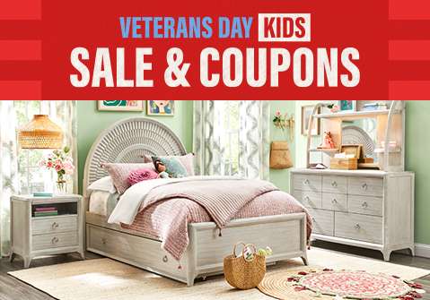 VETERANS DAY KIDS SALE & COUPONS. A bedroom set with a bed, nightstand, and dresser.
