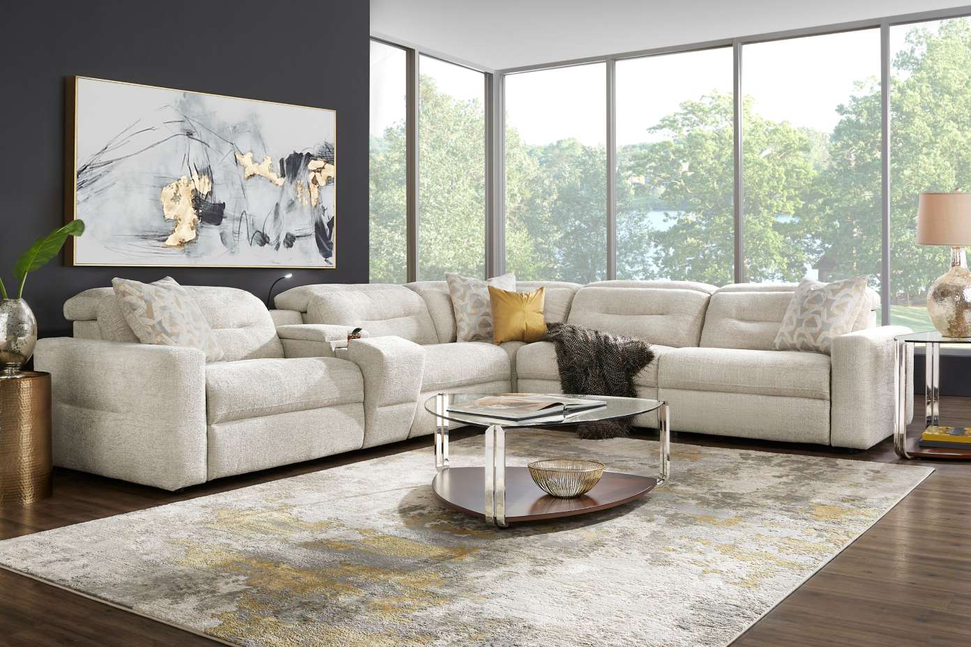 Beige sectional sofa with built-in cup holders.
