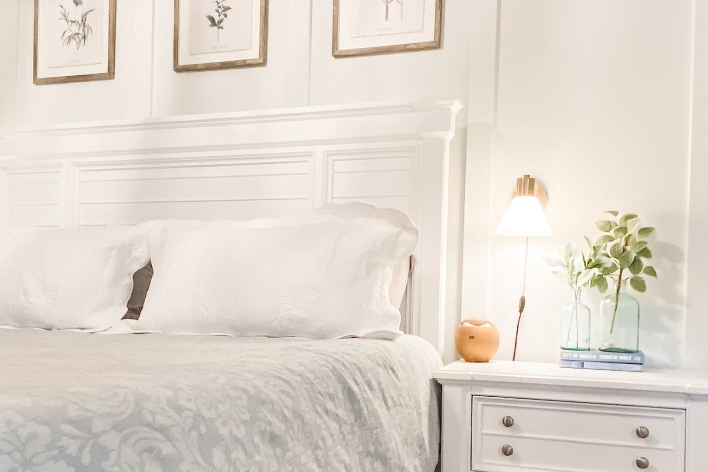 gold wall score with white bed 
