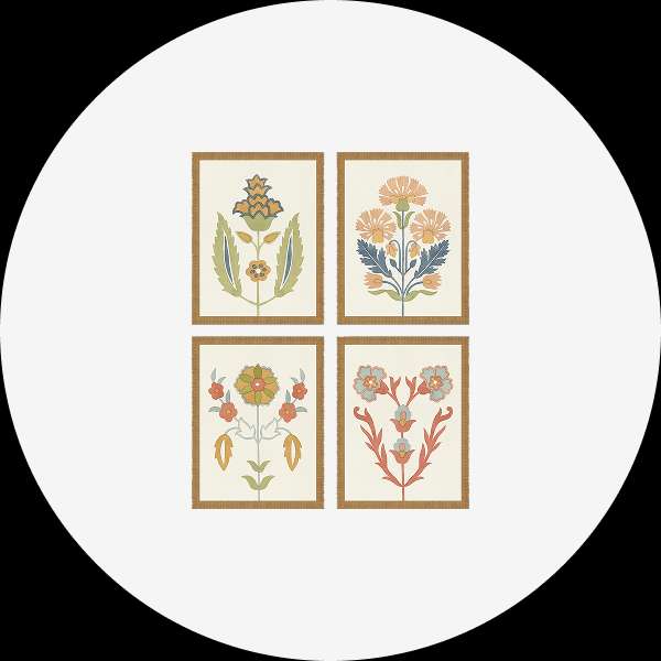 Four framed floral art prints in a white circle.
