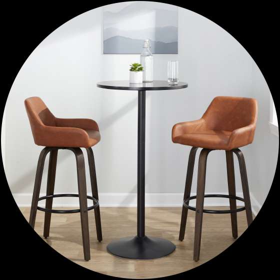 Two brown leather bar stools with a black table.
