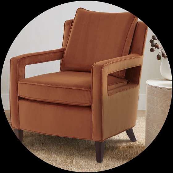 Orange velvet armchair.
