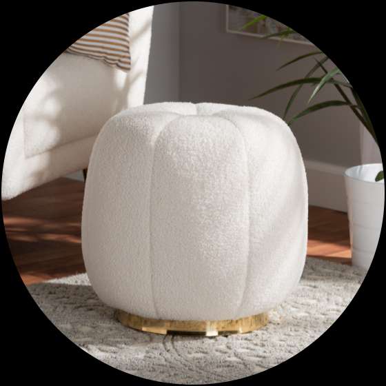 White ottoman with a gold base.

