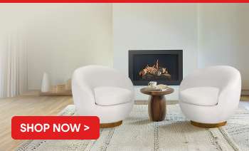 SHOP NOW > Two white swivel chairs in a living room.
