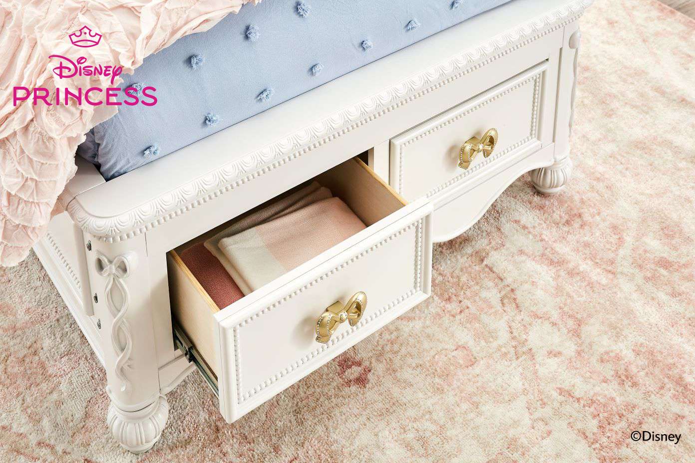 Disney Princess bed with drawers.

