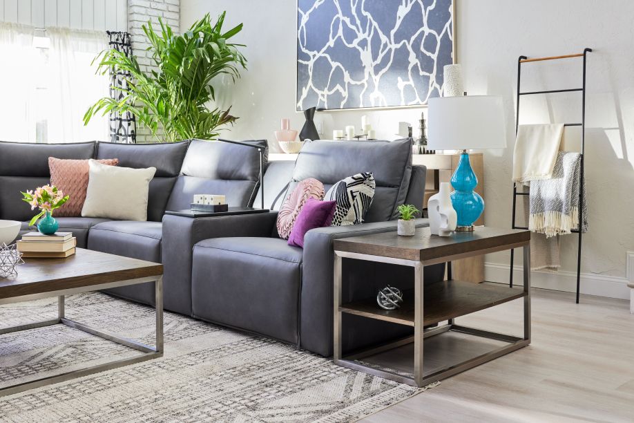 blue couch and dark brown side table