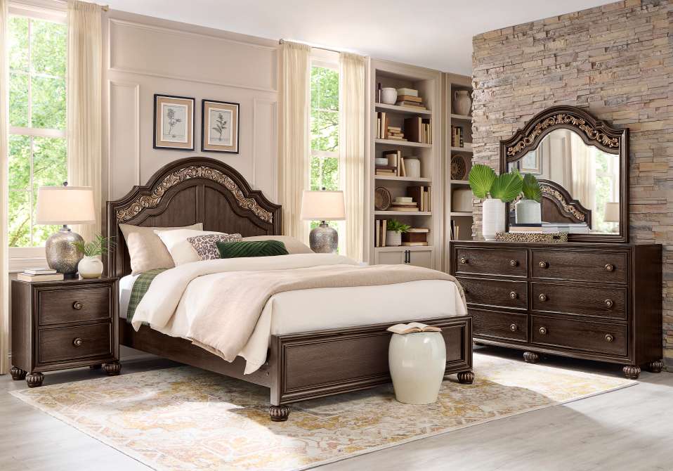 Bedroom set with a bed, nightstands, dresser, and mirror.
