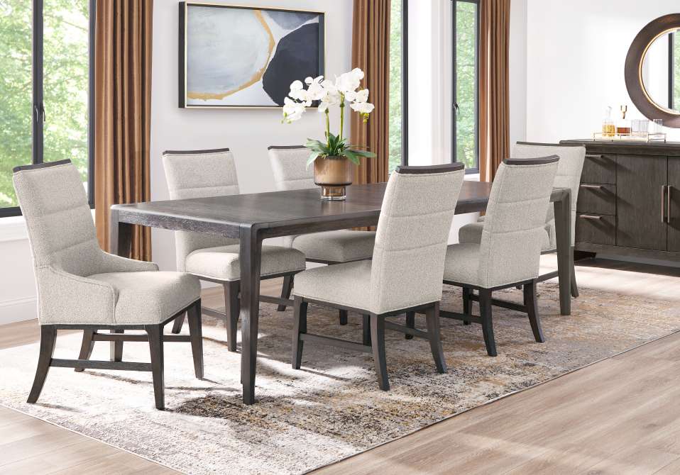 Dining room set with a table, chairs, and a sideboard.
