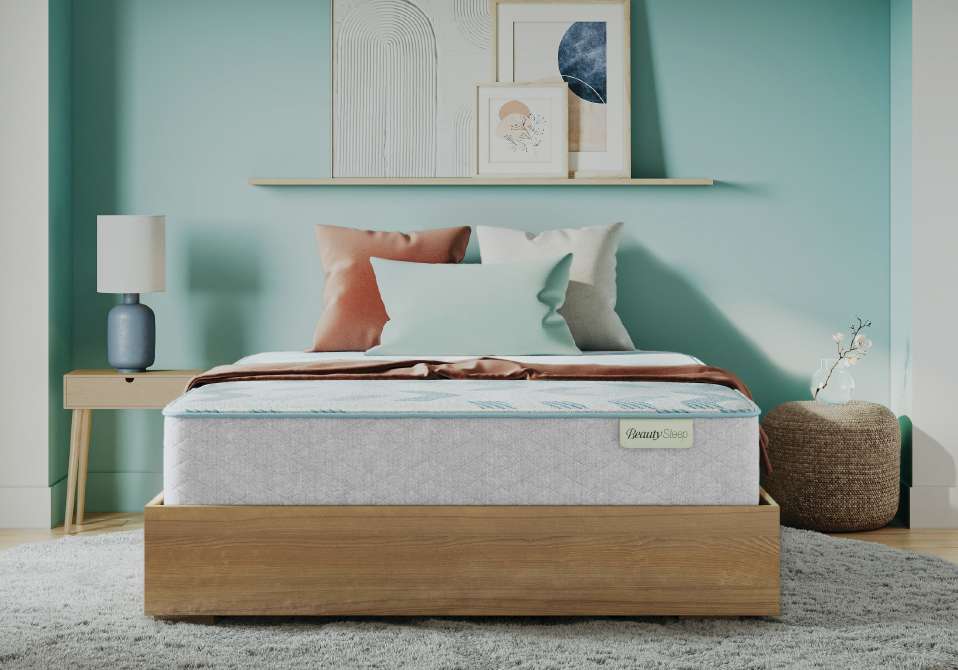 BeautySleep mattress on a wooden bed frame.
