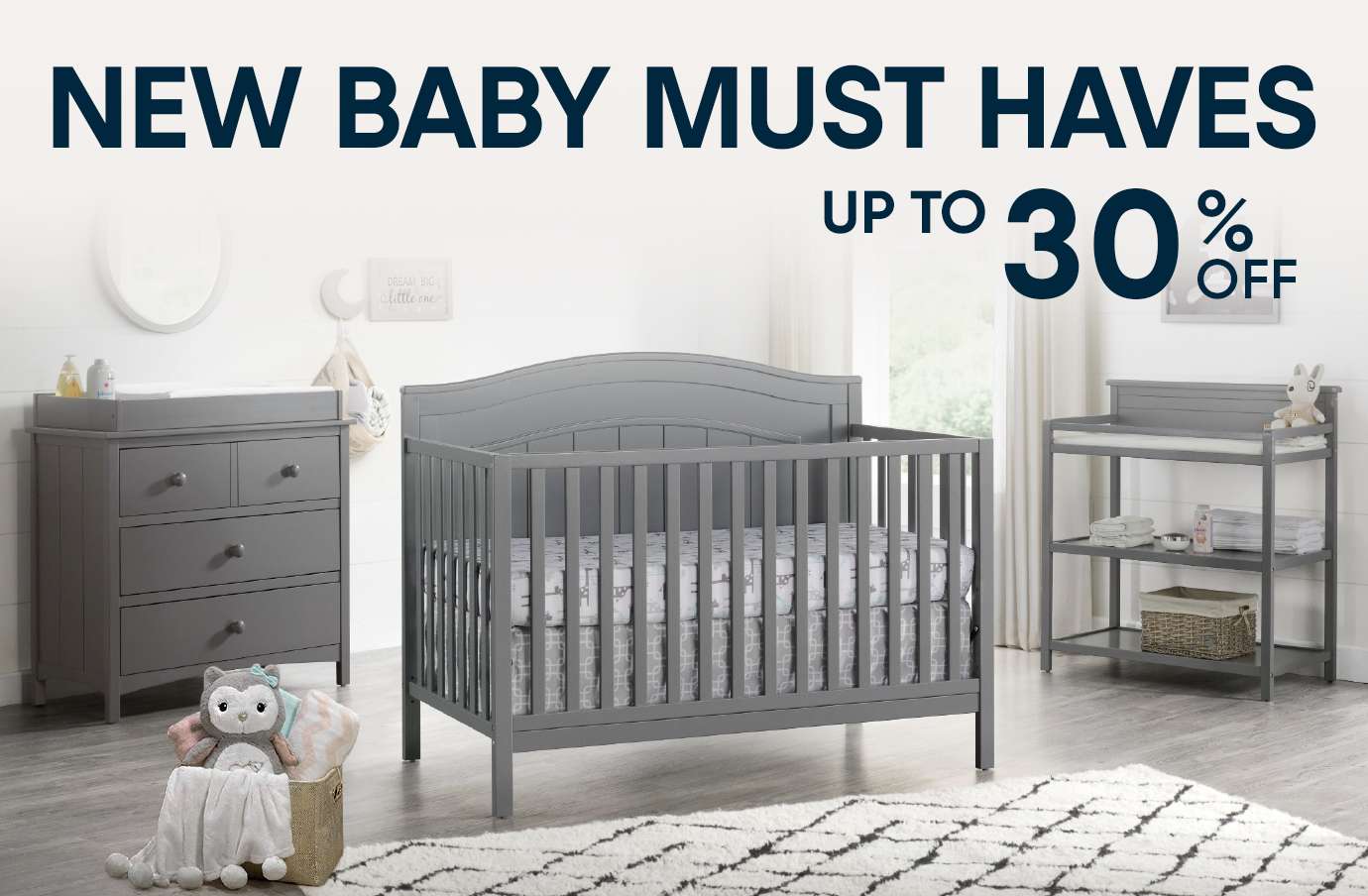 NEW BABY MUST HAVES UP TO 30% OFF. A nursery set with a crib, changing table, and dresser.
