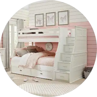 White bunk bed with stairs and storage drawers.
