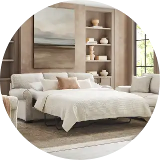 Beige sofa bed in a living room.
