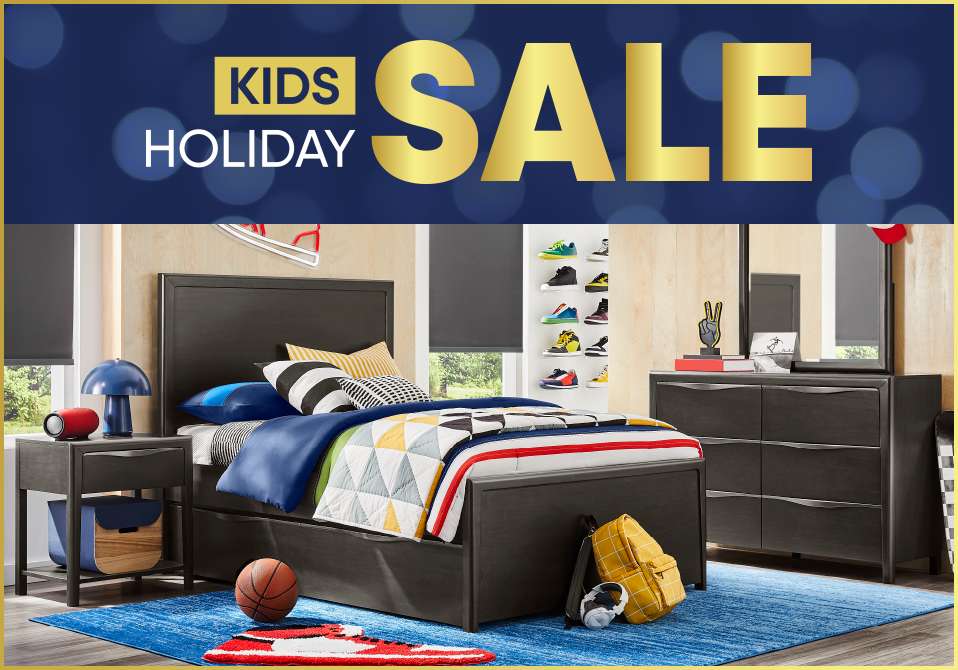 KIDS HOLIDAY SALE. Bedroom furniture set with bed, dresser, and nightstand.
