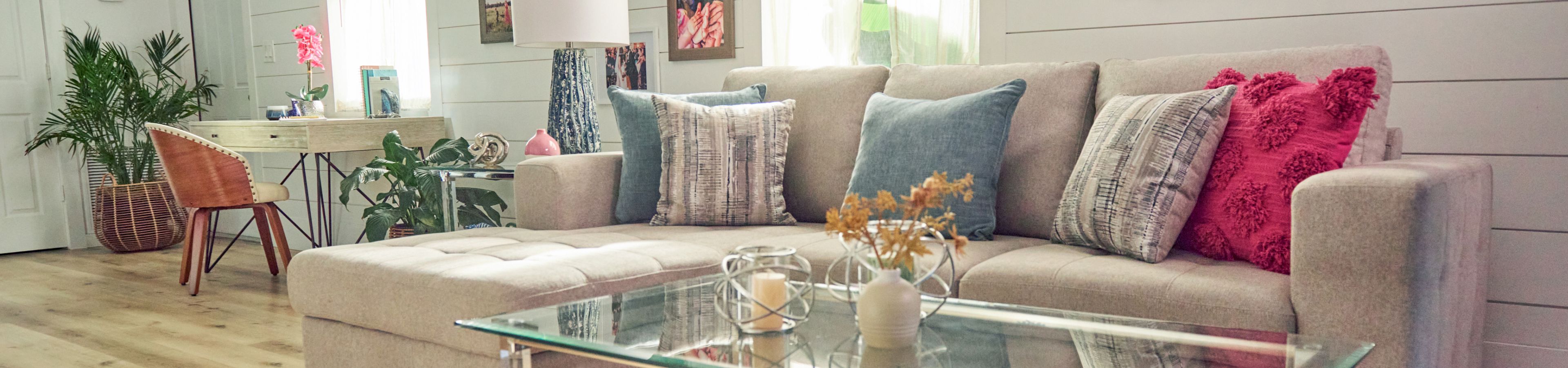 small couch with decorative pillows